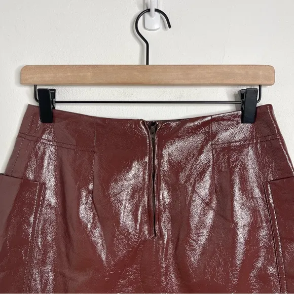 ANTHROPOLOGIE Maeve Cargo Mini Skirt Faux Patent Leather Wine Pockets Size 2