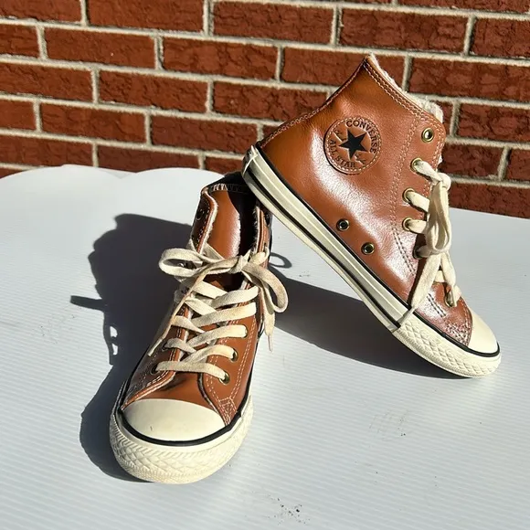 Converse ,youth size 3 , brown, leather, upper and rubber bottom in white