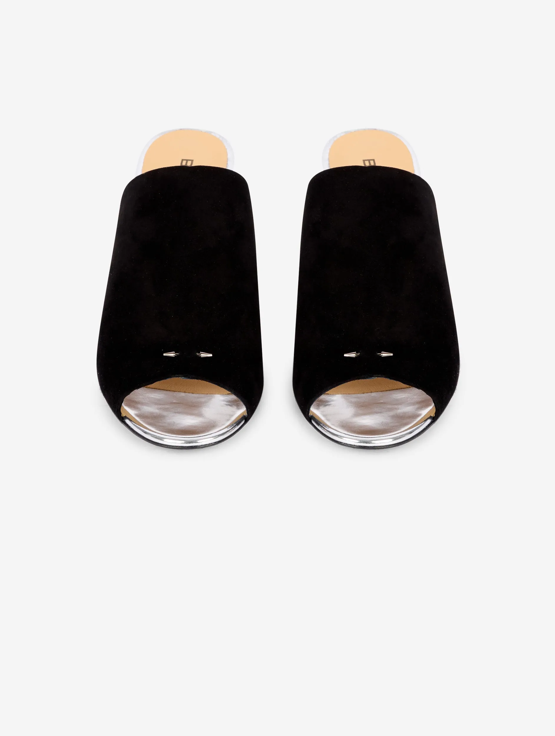 Mules in black suede