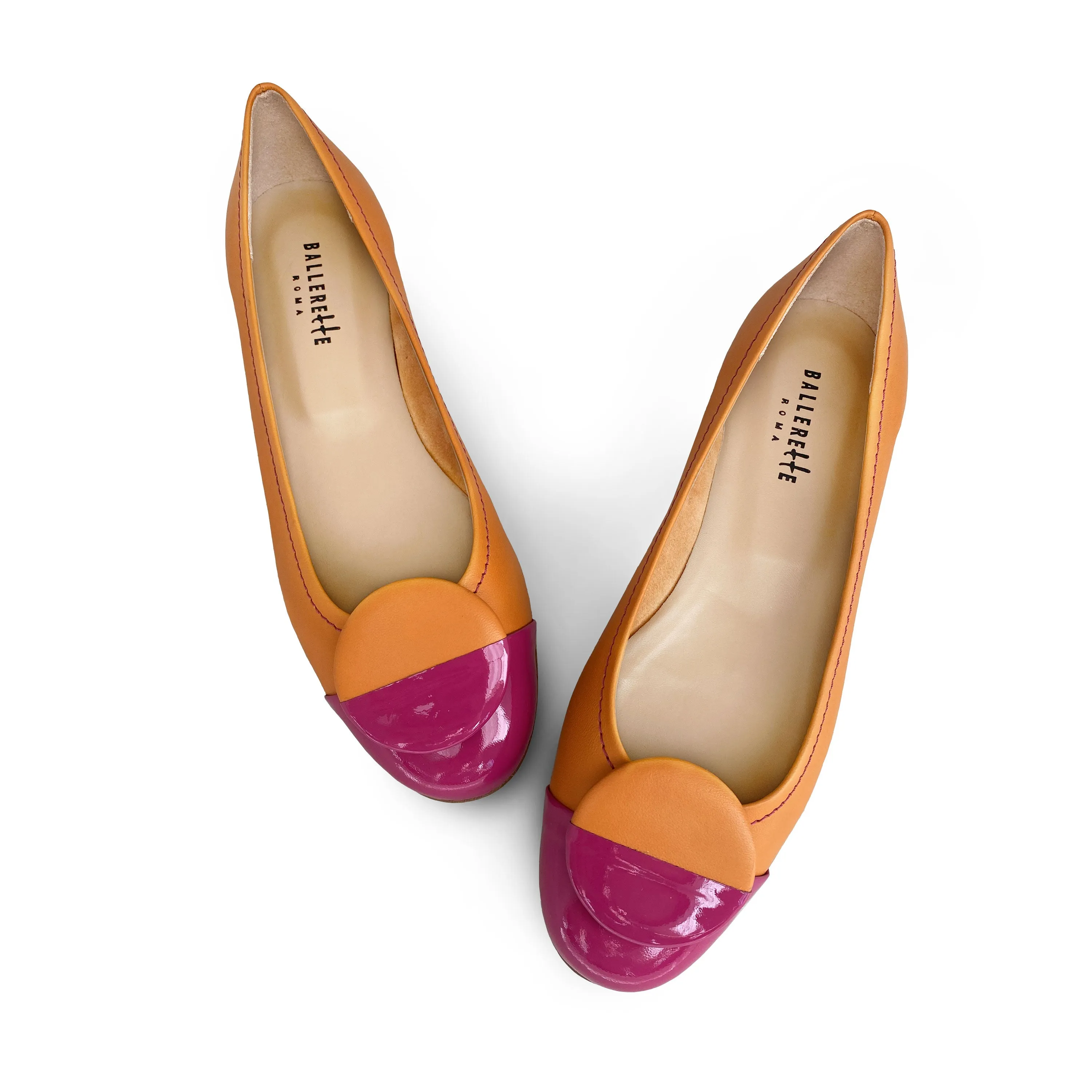 Orange leather ballet flats with fuchsia patent leather toe and stud