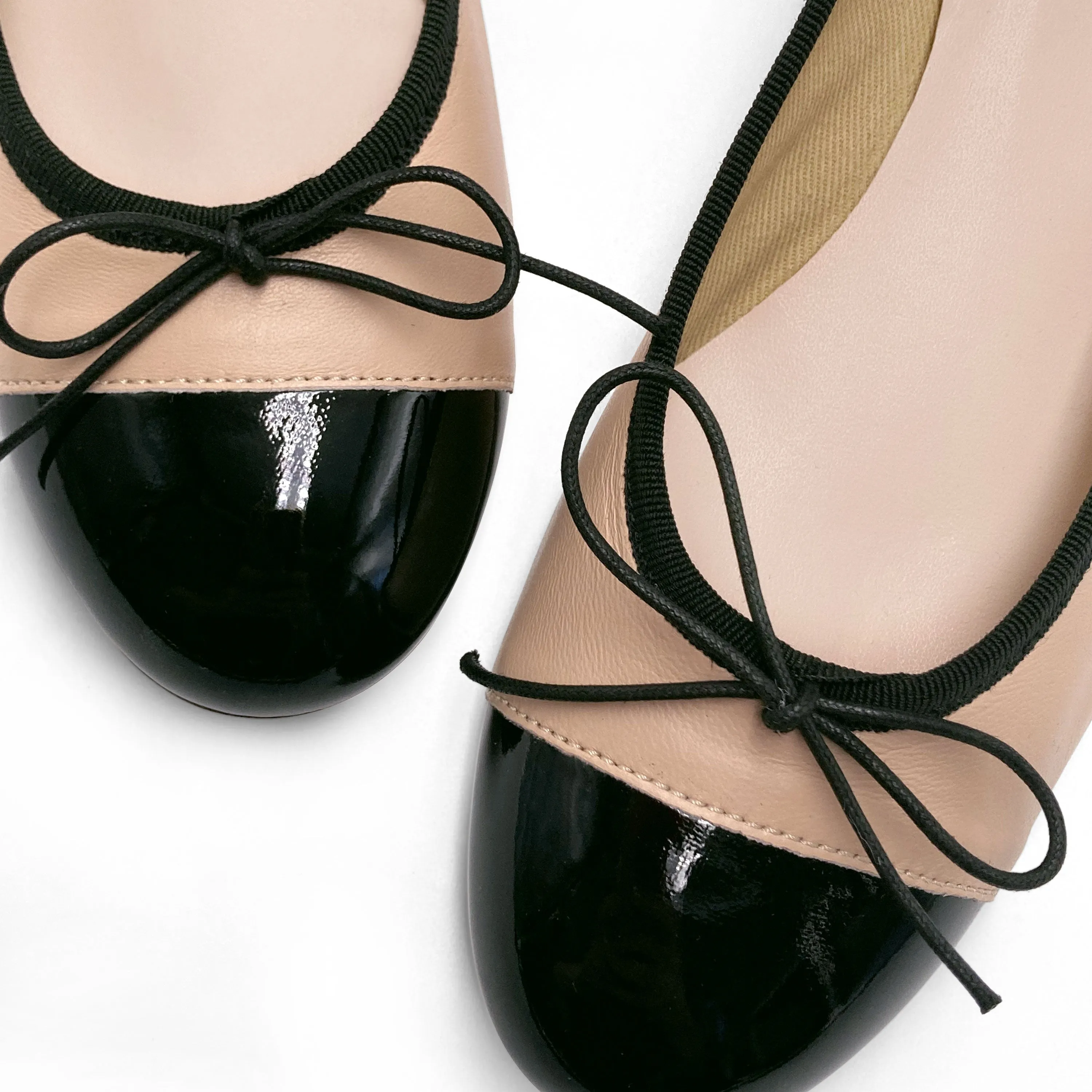 Powder pink leather ballet flats with high heel and patent toe