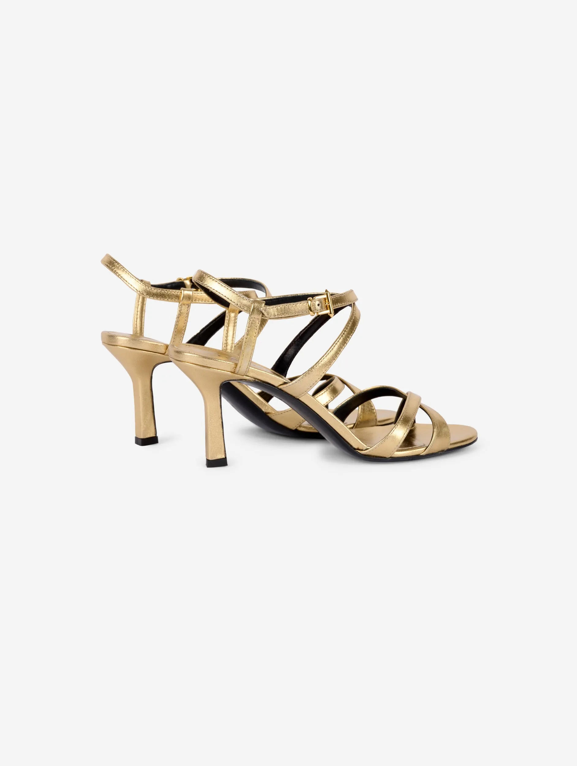 Sandals in gold metallic leather