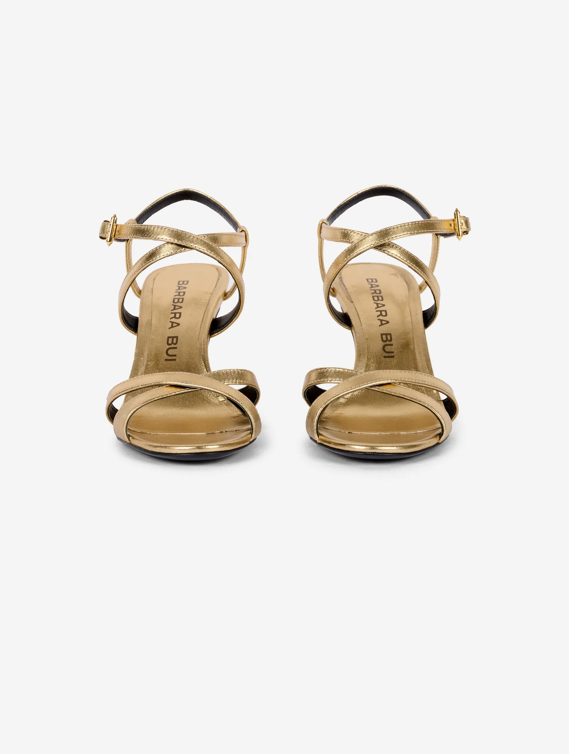 Sandals in gold metallic leather