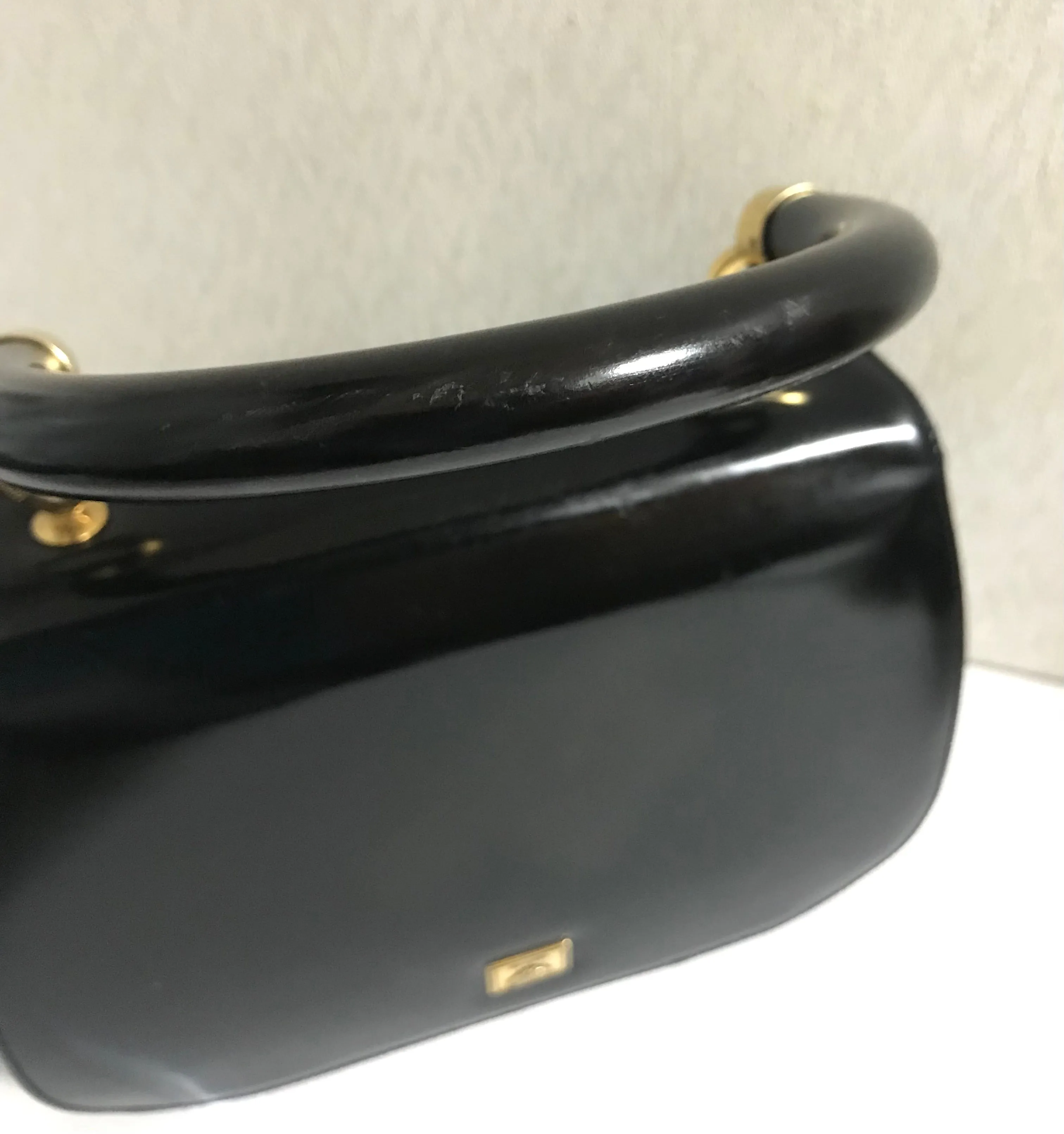 Vintage MOSCHINO black patent enamel Kelly style handbag with M logo and heart motifs. Masterpiece by Redwall. 050323re4
