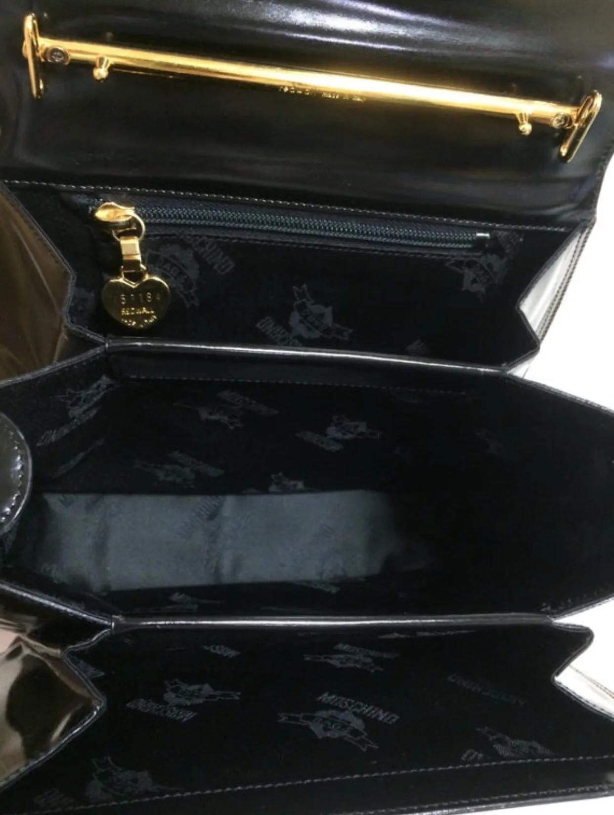 Vintage MOSCHINO black patent enamel Kelly style handbag with M logo and heart motifs. Masterpiece by Redwall. 050323re4