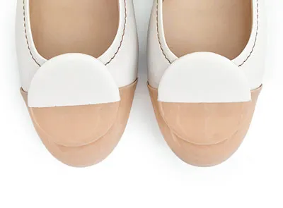 White leather ballet flats, taupe patent leather toe and stud